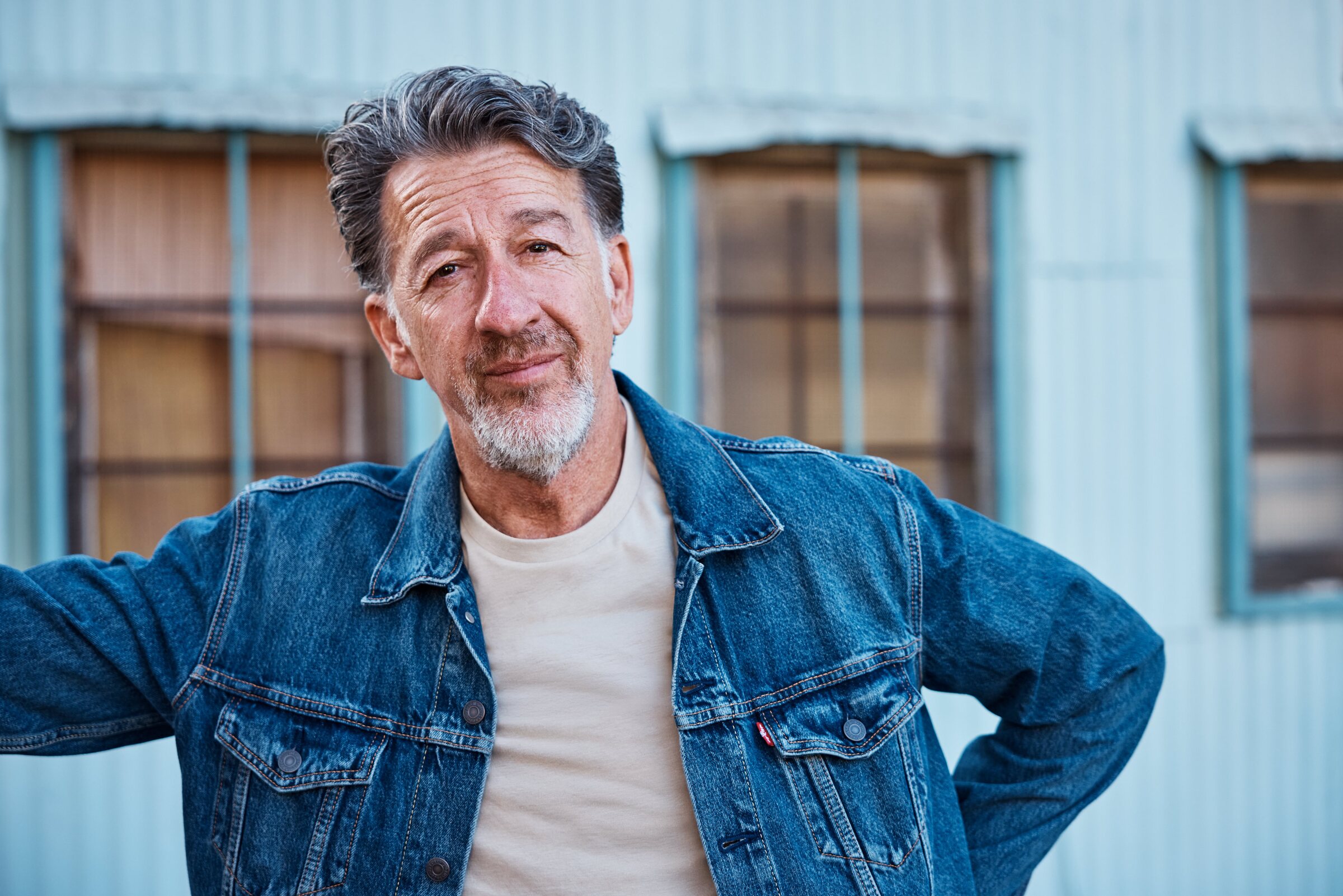 Portrait of Djilali Rez-Kallah in a denim jacket